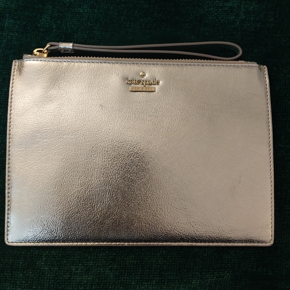 kate spade Handbags - Kate Spade Silver Wristlet
